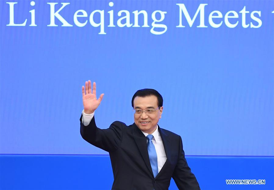 Chinese Premier Li Keqiang arrives for a press conference at the Great Hall of the People in Beijing, capital of China, March 15, 2017. (Xinhua/Jin Liangkuai)