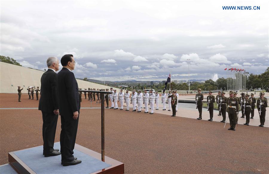 Chinese Premier Li Keqiang attends a welcome ceremony held by Australian Prime Minister Malcolm Turnbull before their talks in Canberra, Australia, March 23, 2017. (Xinhua/Pang Xinglei)