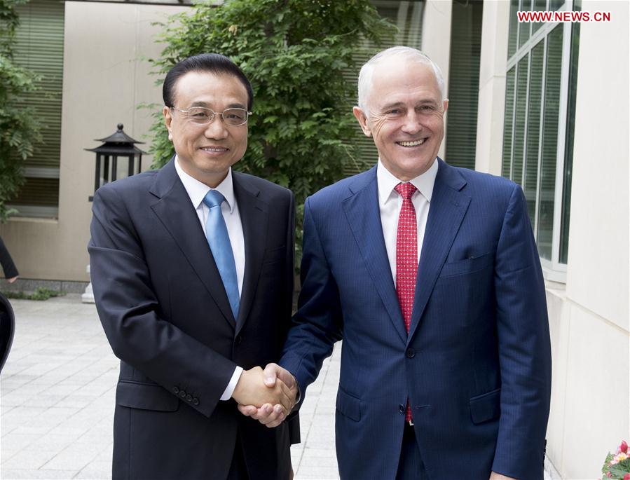 Chinese Premier Li Keqiang (L) and his Australian counterpart Malcolm Turnbull hold the fifth annual meeting of the two prime ministers in Canberra, Australia, March 24, 2017. (Xinhua/Li Xueren)