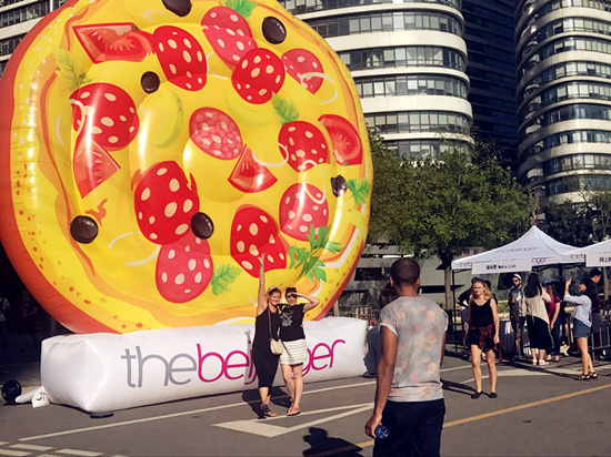 Big inflated pizza at the entrance. (Photo/ Qian Ding)