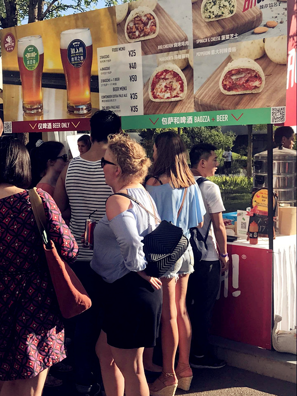 Baozza is a unique form of pizza that combines Chinese food Baozi and Pizza together, which was a big hit at the fest. (Photo/ Qian Ding)