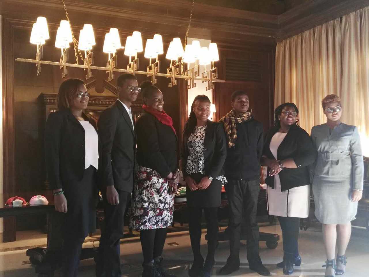  Ms. Cherett Campbell, Minister Counsellor at the Jamaican Embassy (3rd left) is surrounded by students from two of the island&rsquo;s leading Universities. They were sponsored by Huawei to engage in its undergraduate training scheme &ldquo;Seeds for the Future&rdquo; program in Beijing.