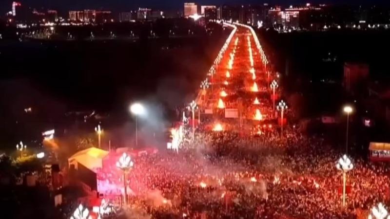 A 3.2-kilometer sea of fire lights up China's Torch Festival
