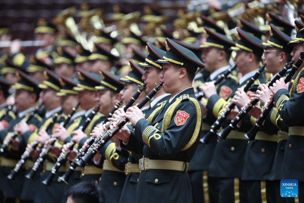 The military band of the Chinese People’s Liberation Army performs during the opening meeting of the fifth session of the 13th National Committee of the Chinese People’s Political Consultative Conference (CPPCC) at the Great Hall of the People in Beijing, capital of China, March 4, 2022. (Xinhua/Ding Haitao)