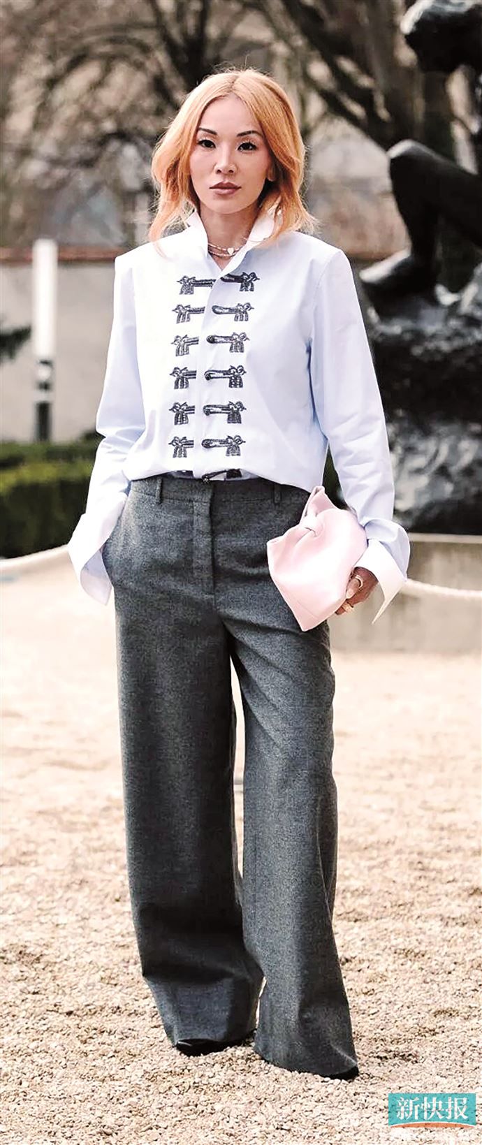 克制的廓形与温润的盘扣相遇，碰撞出东西方融合的独特气质。